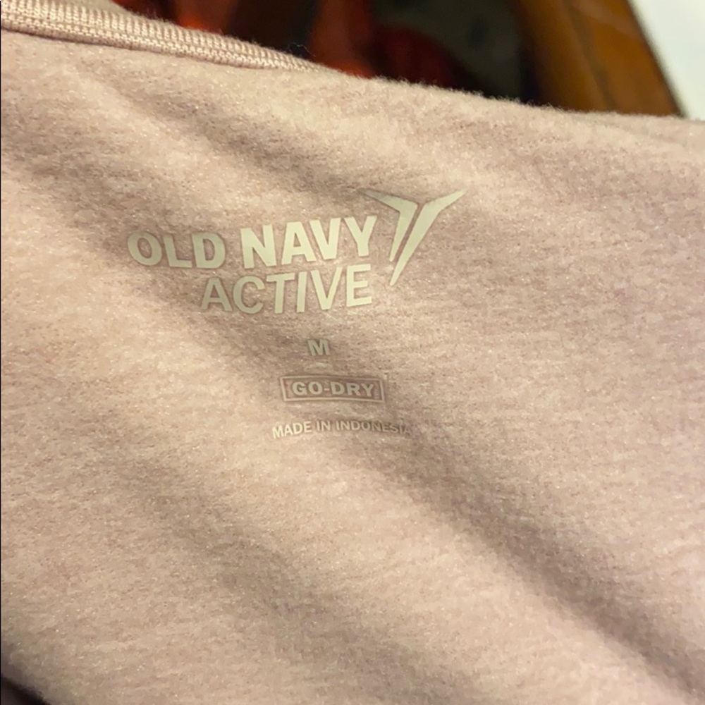 Pink zip up athletic jacket